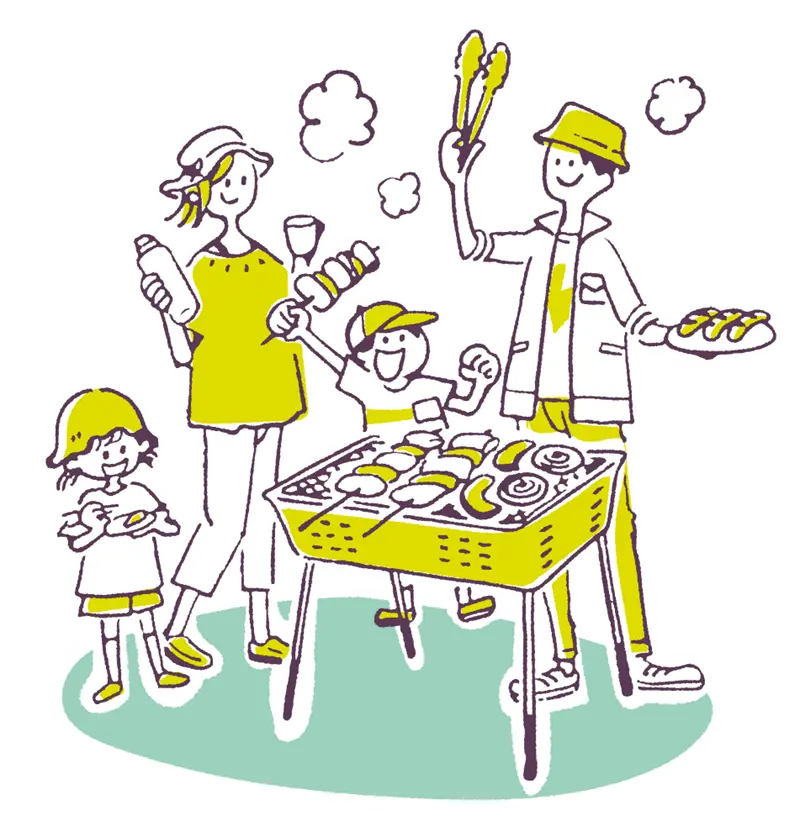 バーベキューを楽しむ親子